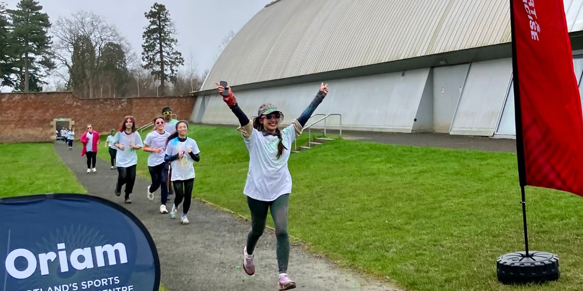 Students crossing the line at Colour Run